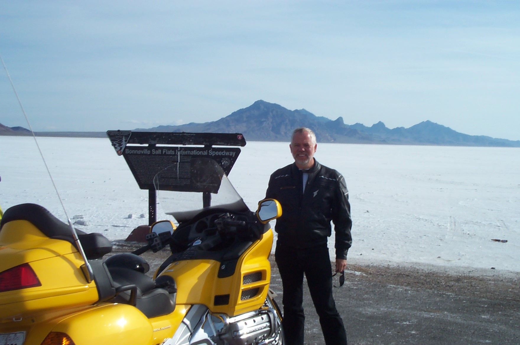 Man with yellow motorcycle