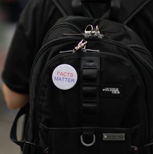 button on backpack: Facts Matter